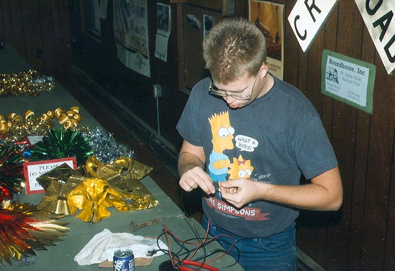 lylex2.jpg - Lyle working on decorations before our Christmas Open House