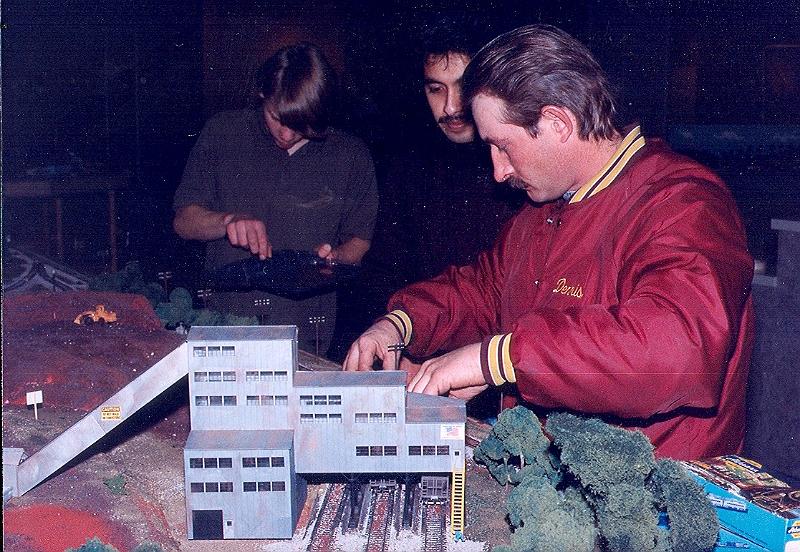 scan0020.jpg - Dennis adding finishing touches to the Crusher building